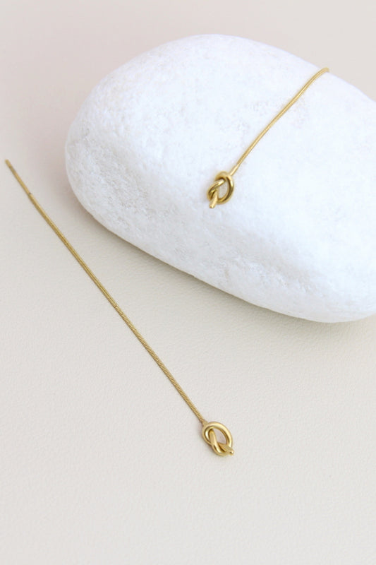 Boucles d’oreilles Nœud Doré